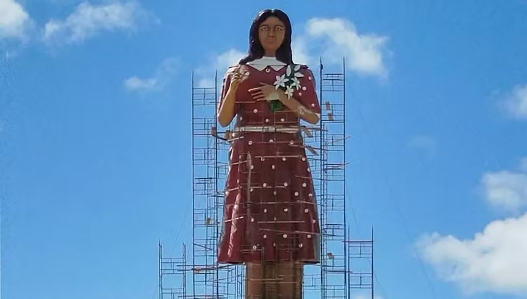 FACE OFF: Fury As £2M Statue Of Saintly Teen Girl Given Face Of Hatchet Faced Hag - Article cover image