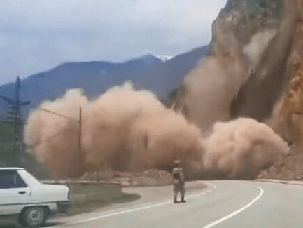 ROAD CLOSED - Massive Landslide Sends Up Huge Cloud Of Debris And Dust - Article cover image
