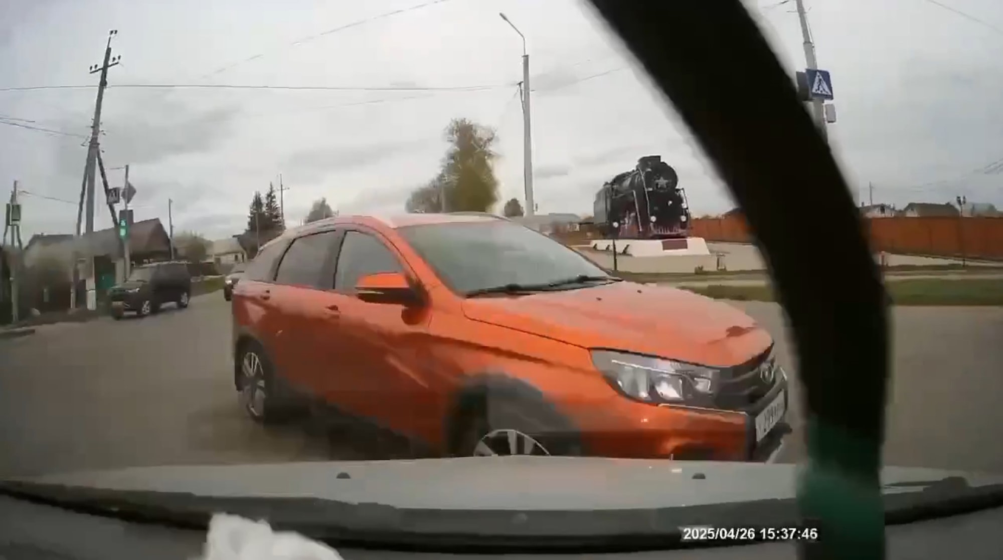 FEELING CROSS - Orange Lada Causes Head-On Crash At Crossing - Article cover image