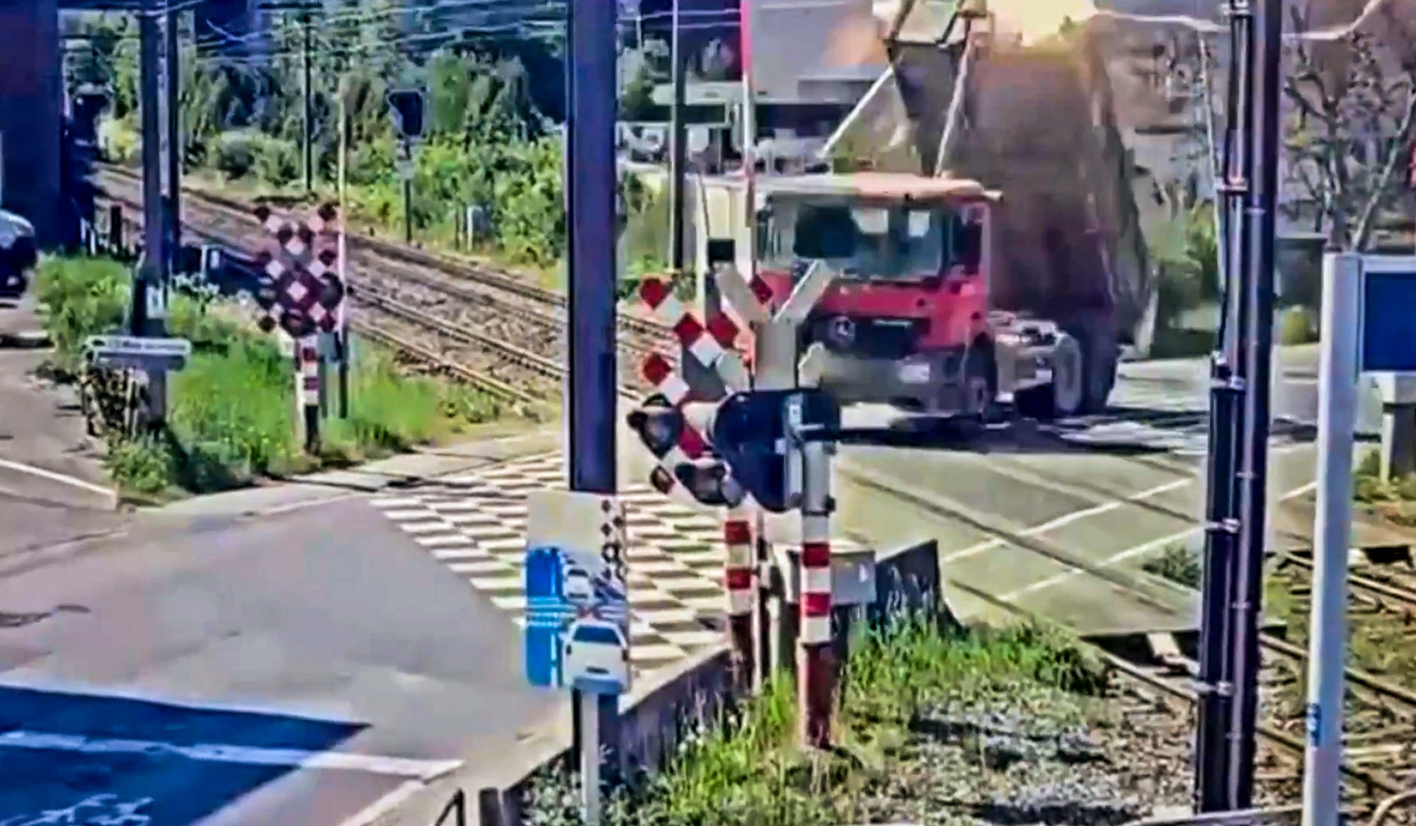 LEVELLED CROSSING - Lorry With Raised Platform Rips Down Power Lines And Topples Over - Article cover image