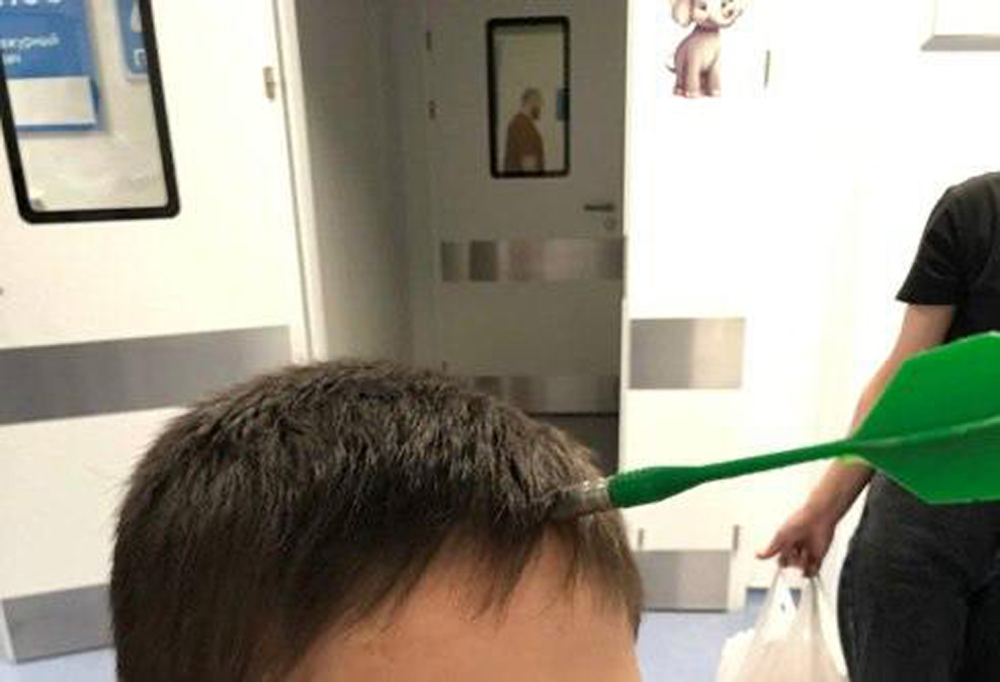 DOUBLE TOP - Ten-Year-Old Boy Had Dart Stuck In His Brain - Article cover image