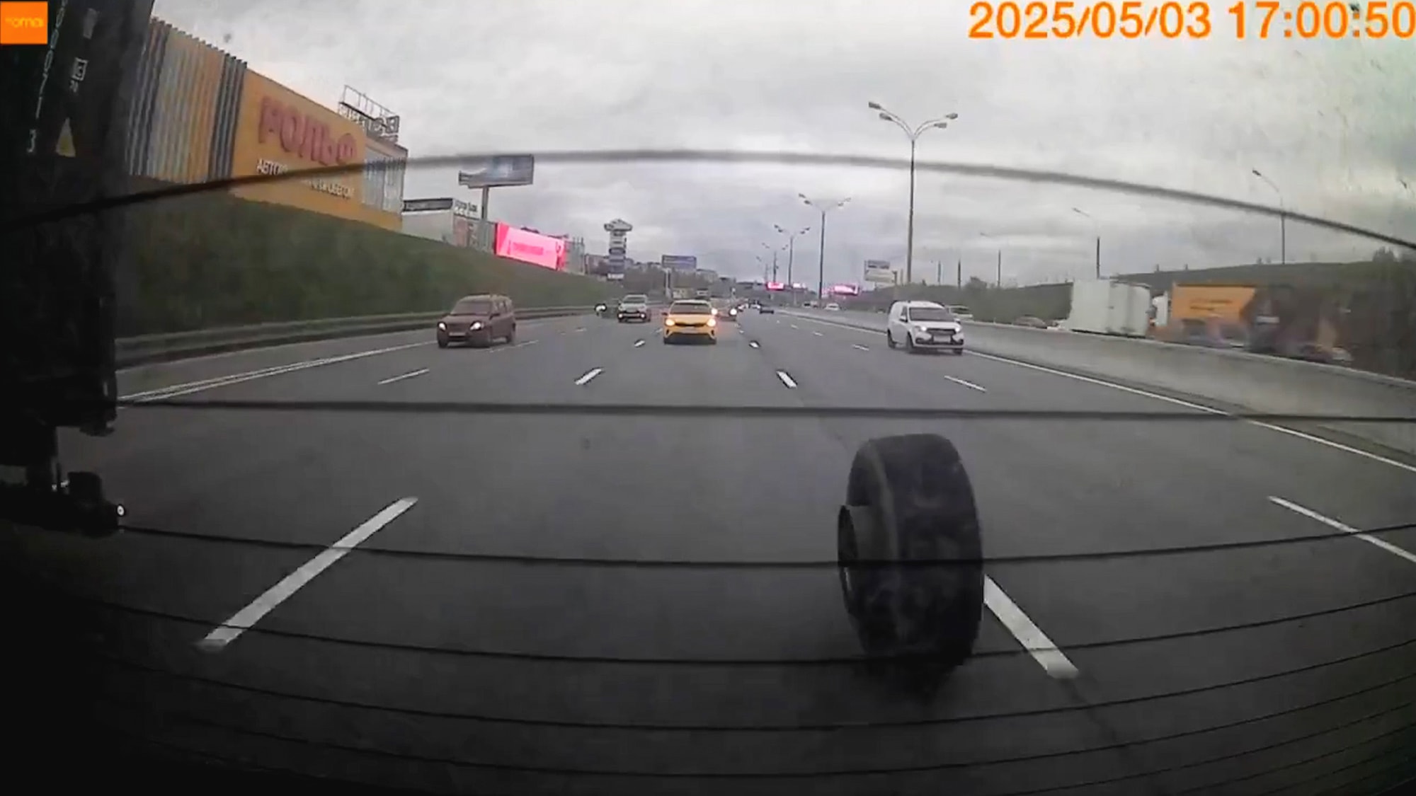 FREE WHEELING - Lorry Loses Wheel On Busy Motorway As Driver Oblivious To Chaos Behind - Article cover image