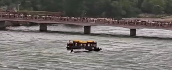 SEA OF SUFFERING - Visitors To Ancient Riverside Buddhist Caves Seek Tranquility As Storm Strikes - Article cover image