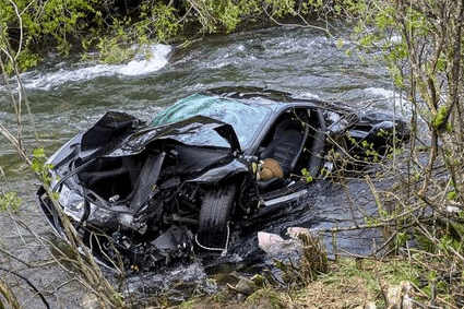 FERRARI CRASH HORROR - British Couple's 205MPH Car Plunges Off Mountain Road - Article cover image