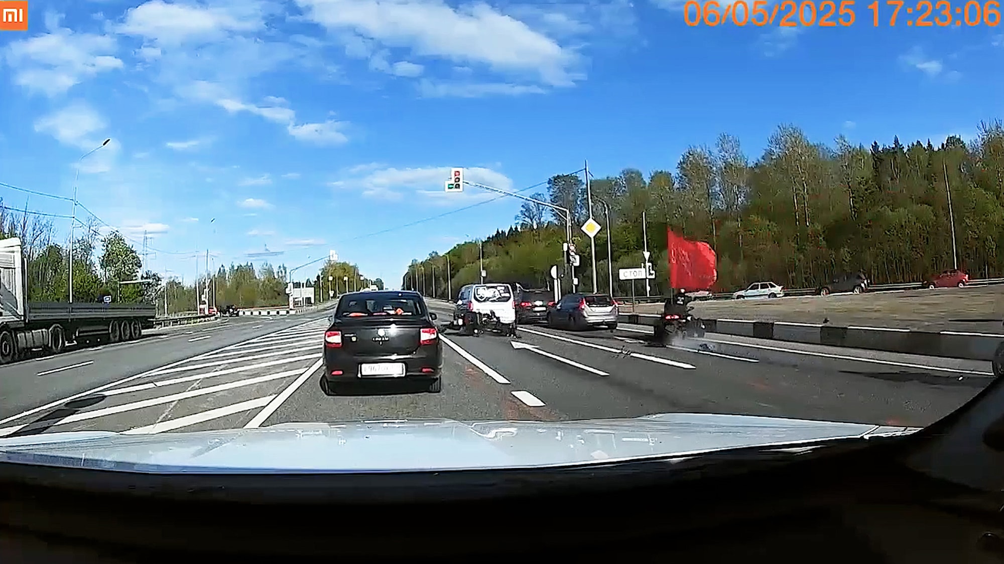 RED FLAG - Bikers Carrying Flags For Rally Crash On Highway - Article cover image