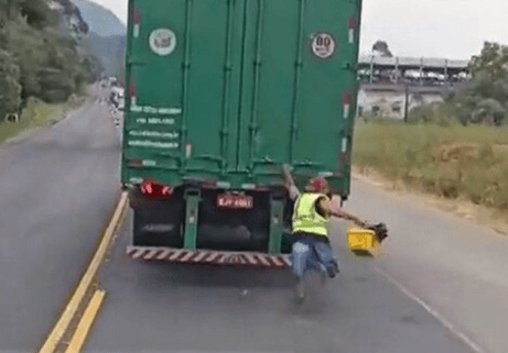 LOOSE GRIP - Man Clings To Moving Lorry Then Falls Under It And Barely Escapes With His Life - Article cover image
