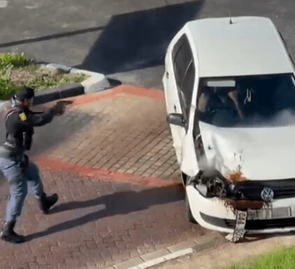 BANGED UP - Robber Seized After Cops Shoot Up Getaway Car - Article cover image