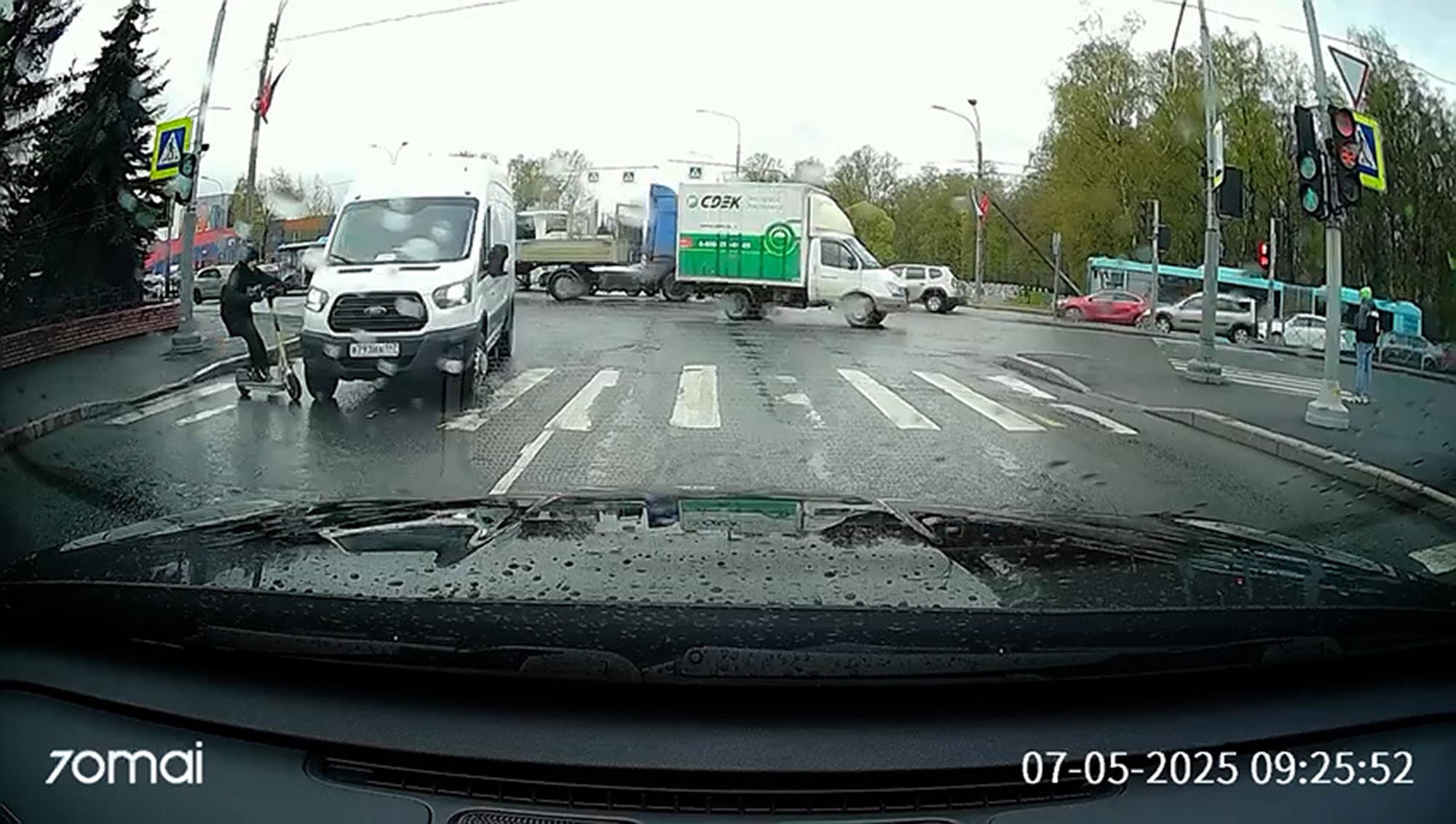 ROUGH RIDE - Scooter Rider Collides With Van At Busy Intersection - Article cover image