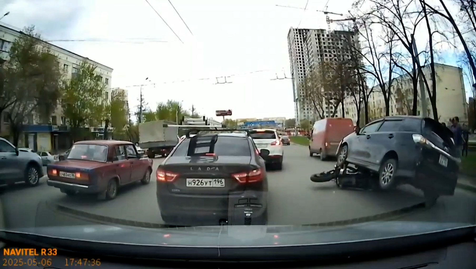 REAR SIGHT - Incredible Moment Car Drives Onto The Back Of A Motorbike - Article cover image