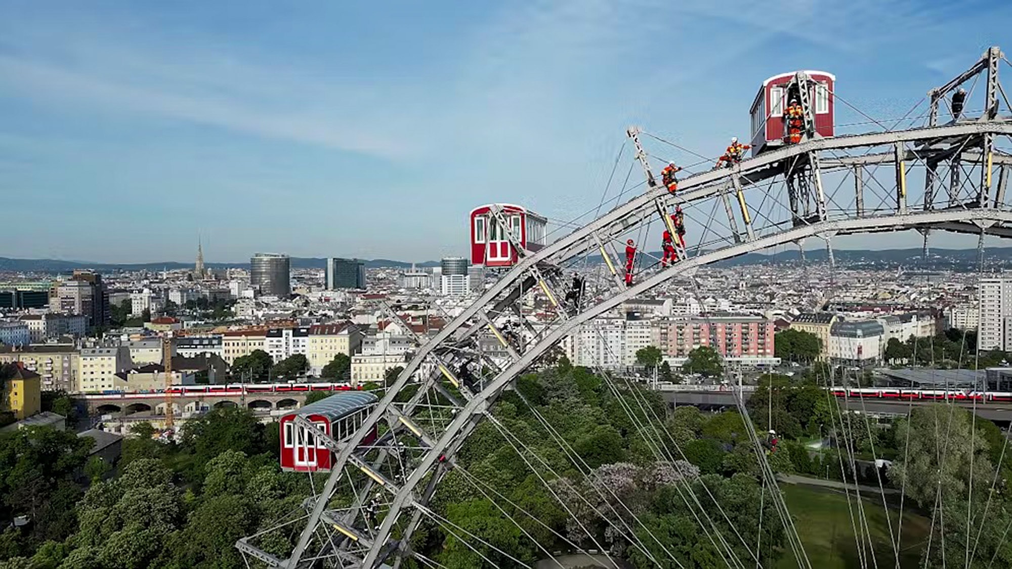 MISSION UNCOMFORTABLE - Firefighters Dangle From 'Third Man' Ferris Wheel - Article cover image