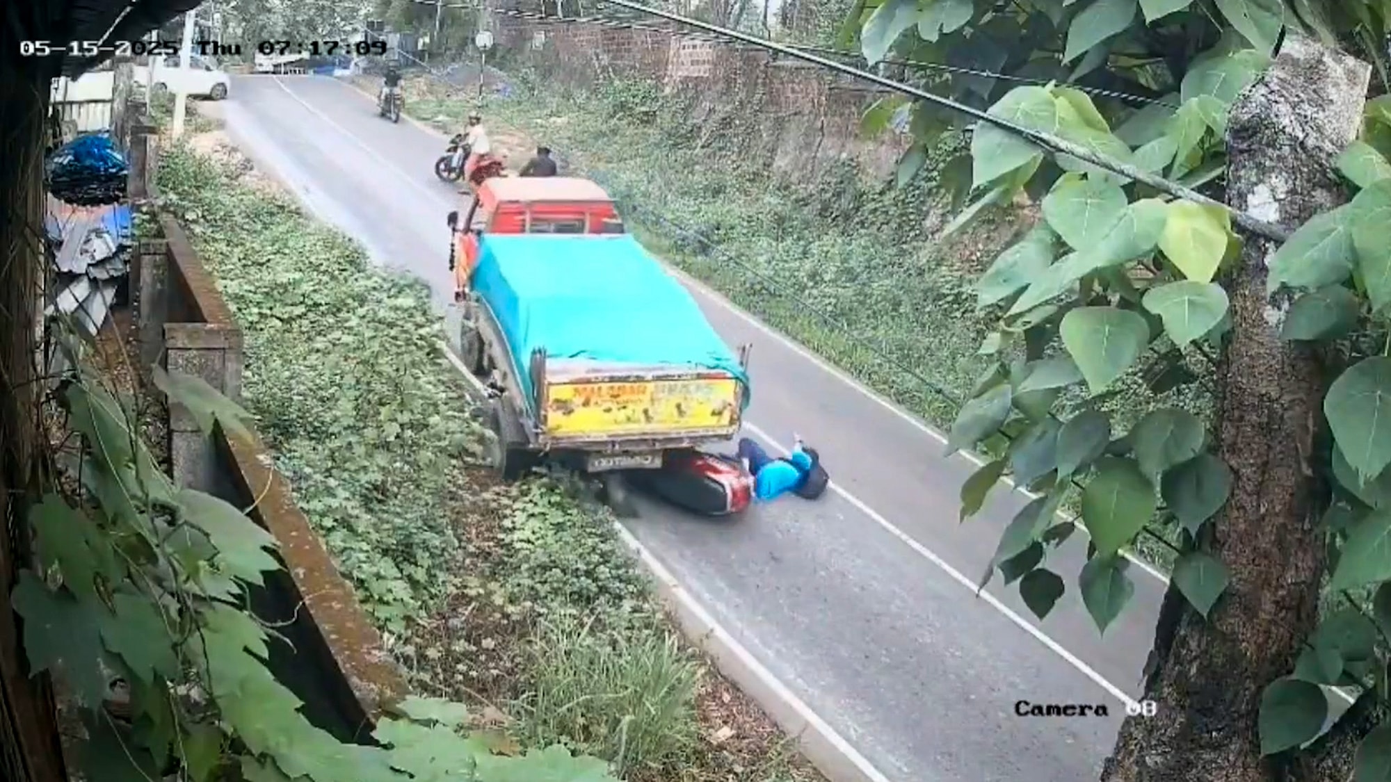 MIRACLE ESCAPE - Woman Dodges Death When Lorry Rolls Back And Crushes Scooter - Article cover image