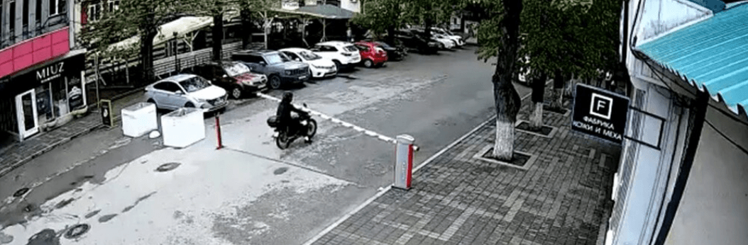 CRASH BARRIER - Foolish Biker Hits Car Park Barrier And Falls Off - Article cover image