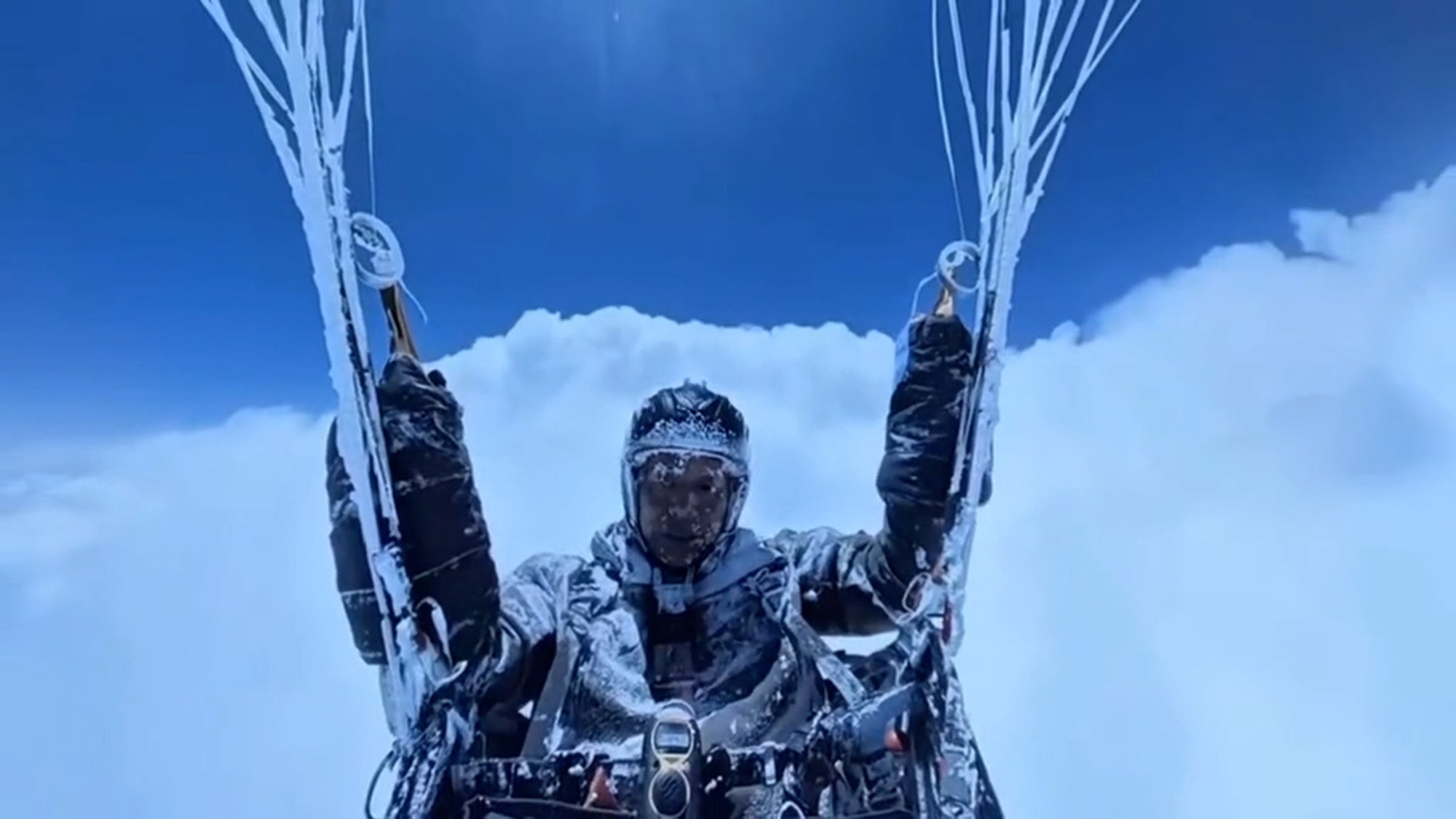 SKY HIGH - Paraglider Survives 8,598-Metre Ascent After Being Sucked Into Storm Cloud - Article cover image