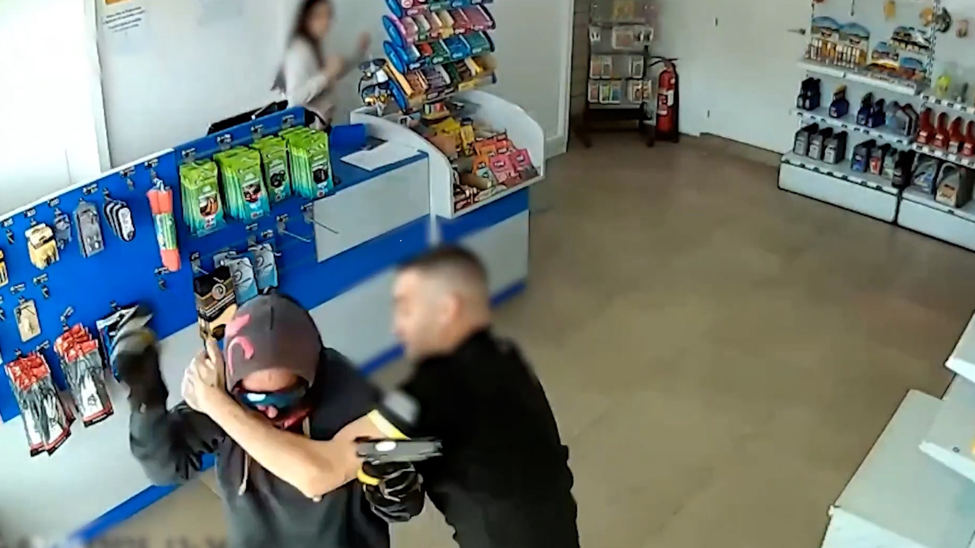 CRIME FIGHTER DUO PRAISED - Brave Staff Take Down Gun-Wielding Thug On Camera - Article cover image