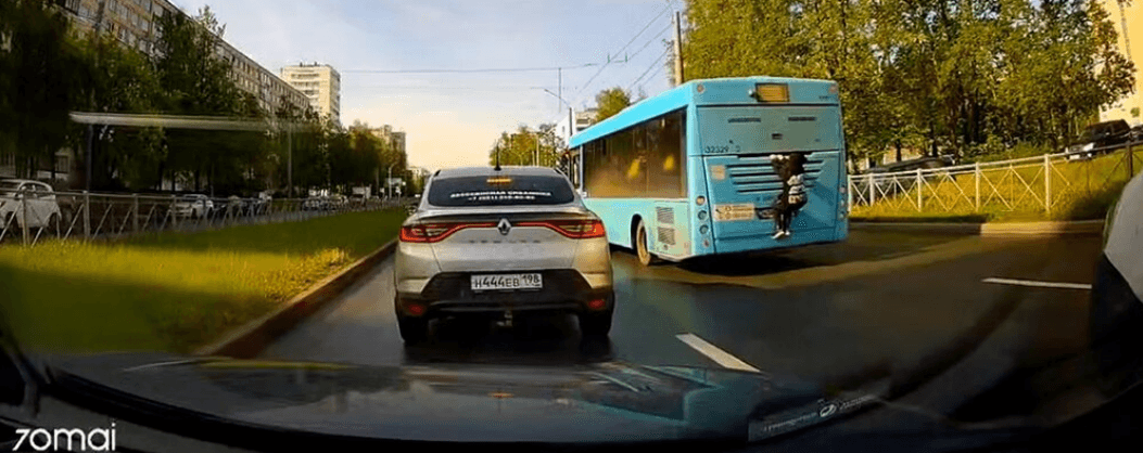 ON THE BUSES - Boy Jumps Off Moving Bus During Stop Before Hopping Back On Again - Article cover image